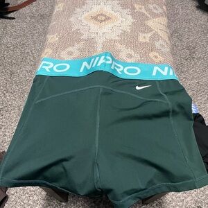 Nike Dark Green Shorts with Turquoise Waistband